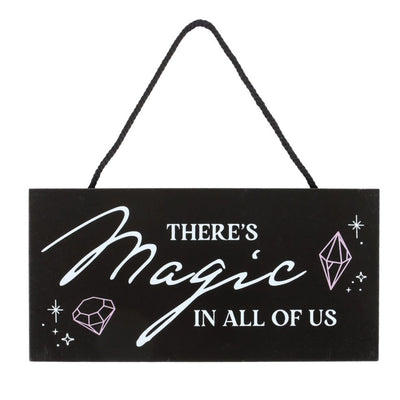 Skylt av trä - There's magic in all of us